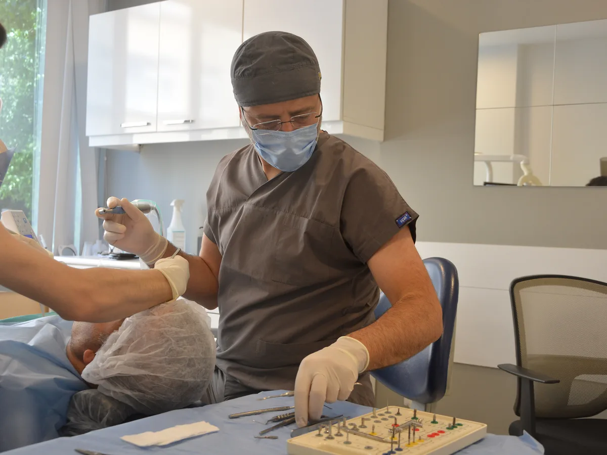 Patient resting at home after dental implant surgery